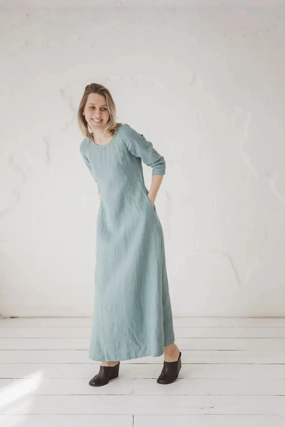 Natural linen maxi dress featuring a relaxed fit and practical side pockets