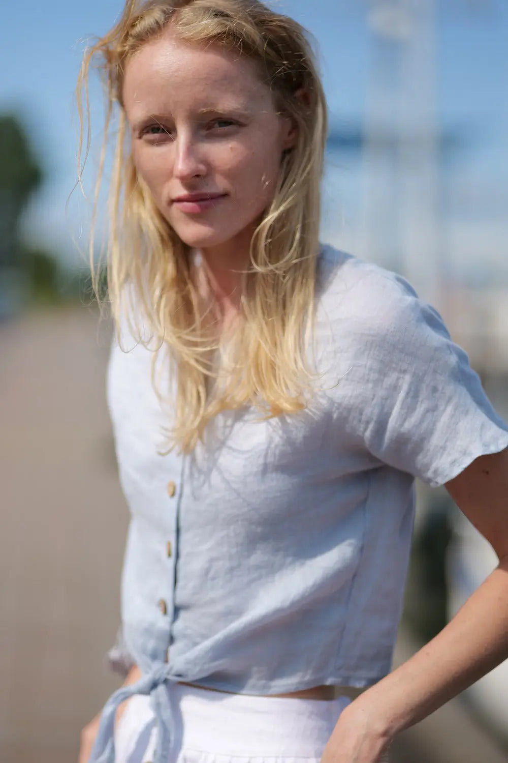 Casual coastal look in linen clothing for warm weather.