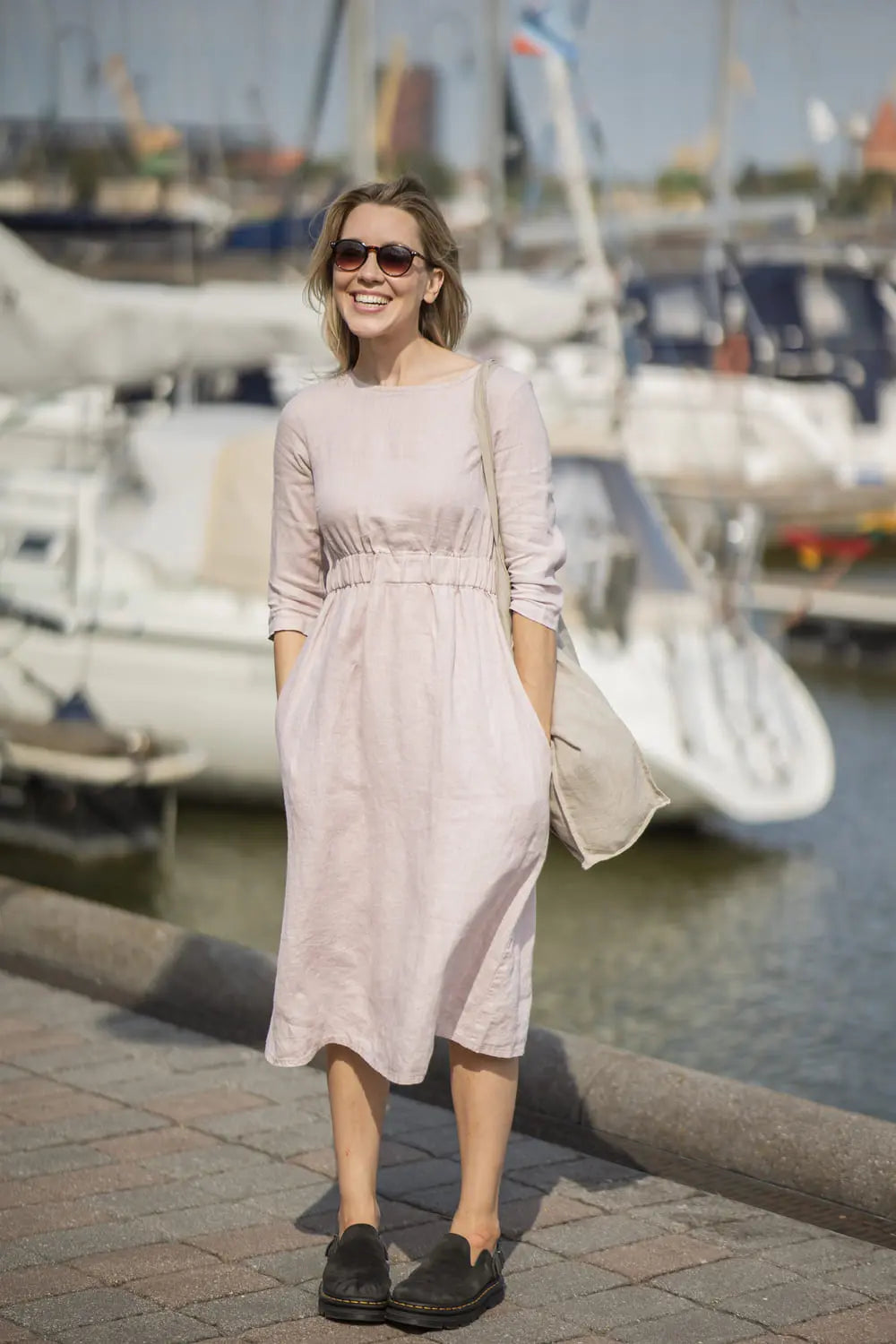 High-Waist Summer Linen Dress, front view, pale dogwood color, with tote bag
