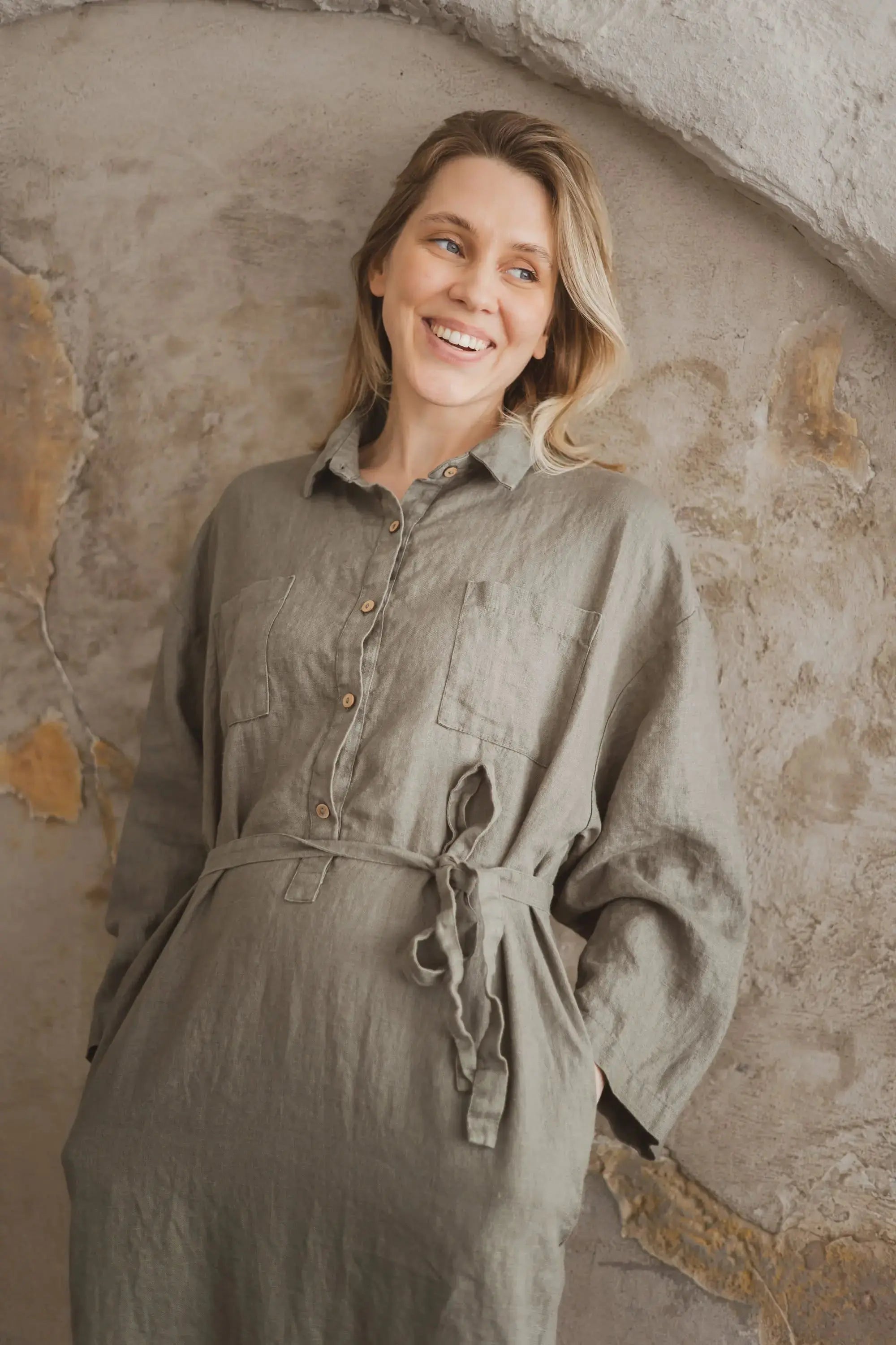Smiling model showcasing the midweight Linen Belted Portofino Shirt Dress 605.