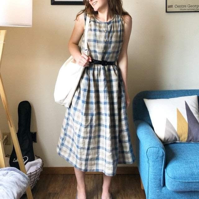 A customer wearing a checkered Epic linen dress.