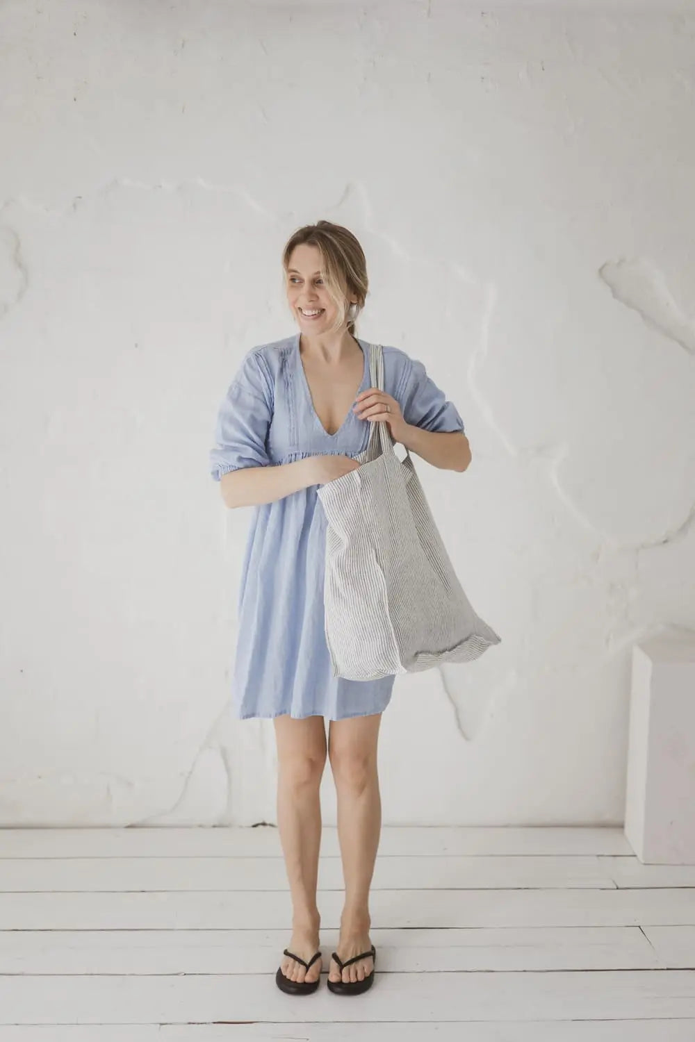 Linen Gathered Waist Mini Dress — full length view with linen tote bag