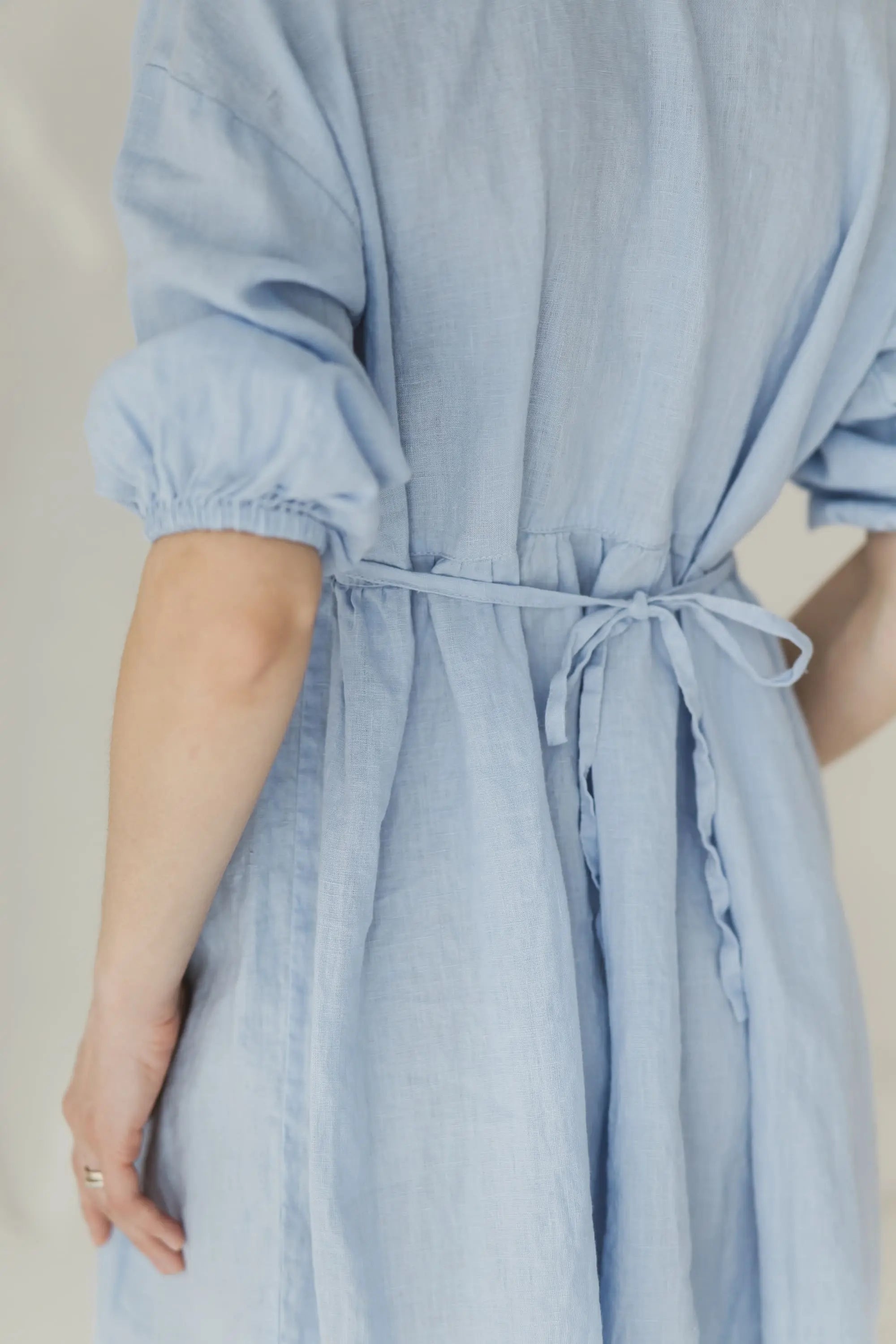 Linen Gathered Waist Mini Dress waist tie detail — back view