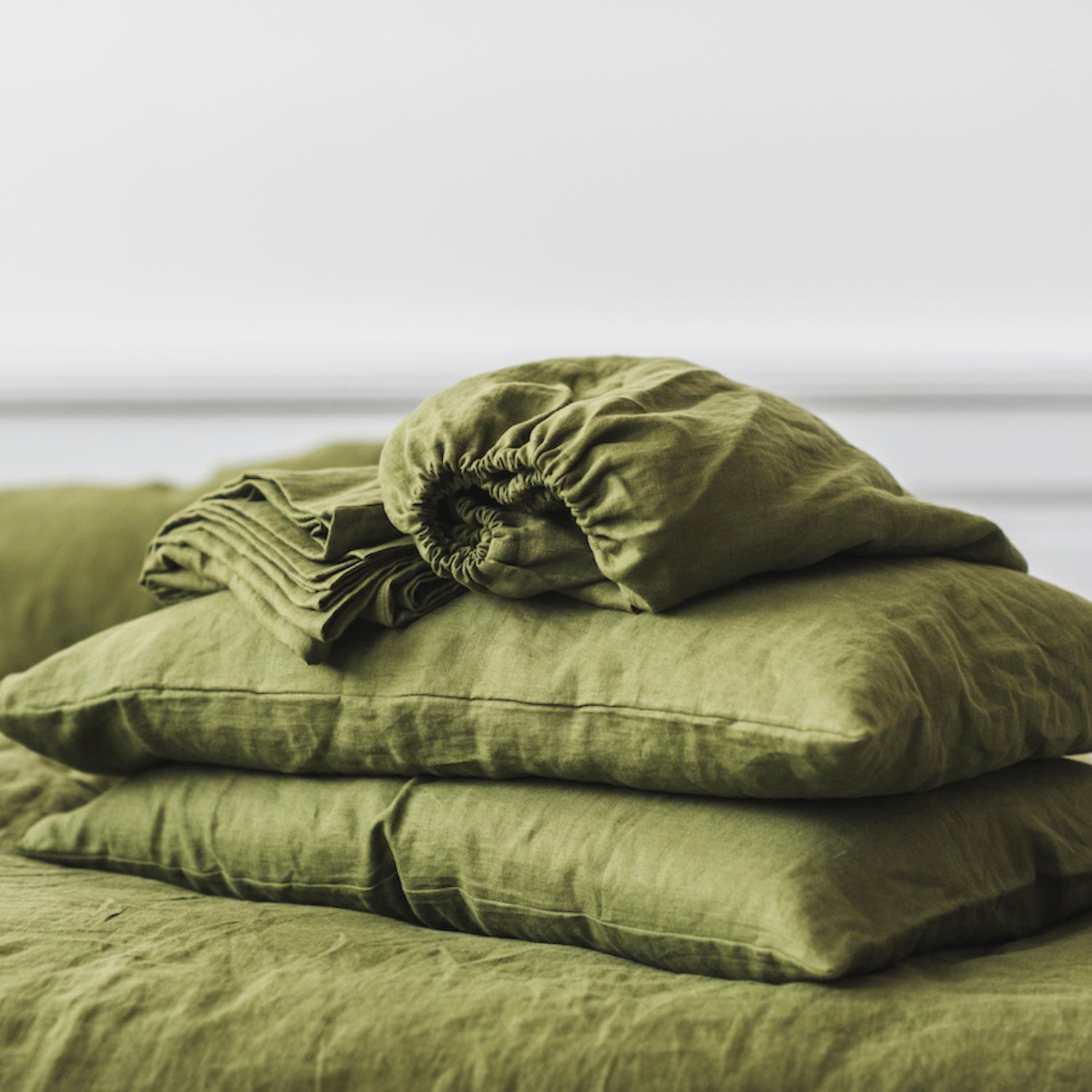 A green moss linen sheet set bundle.