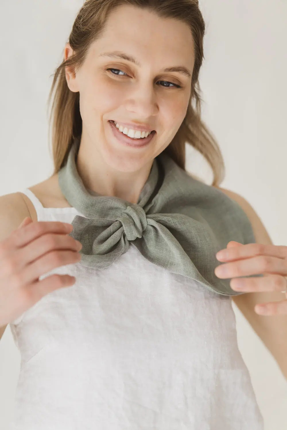 Light green sage linen scarf with a tie-loop detail